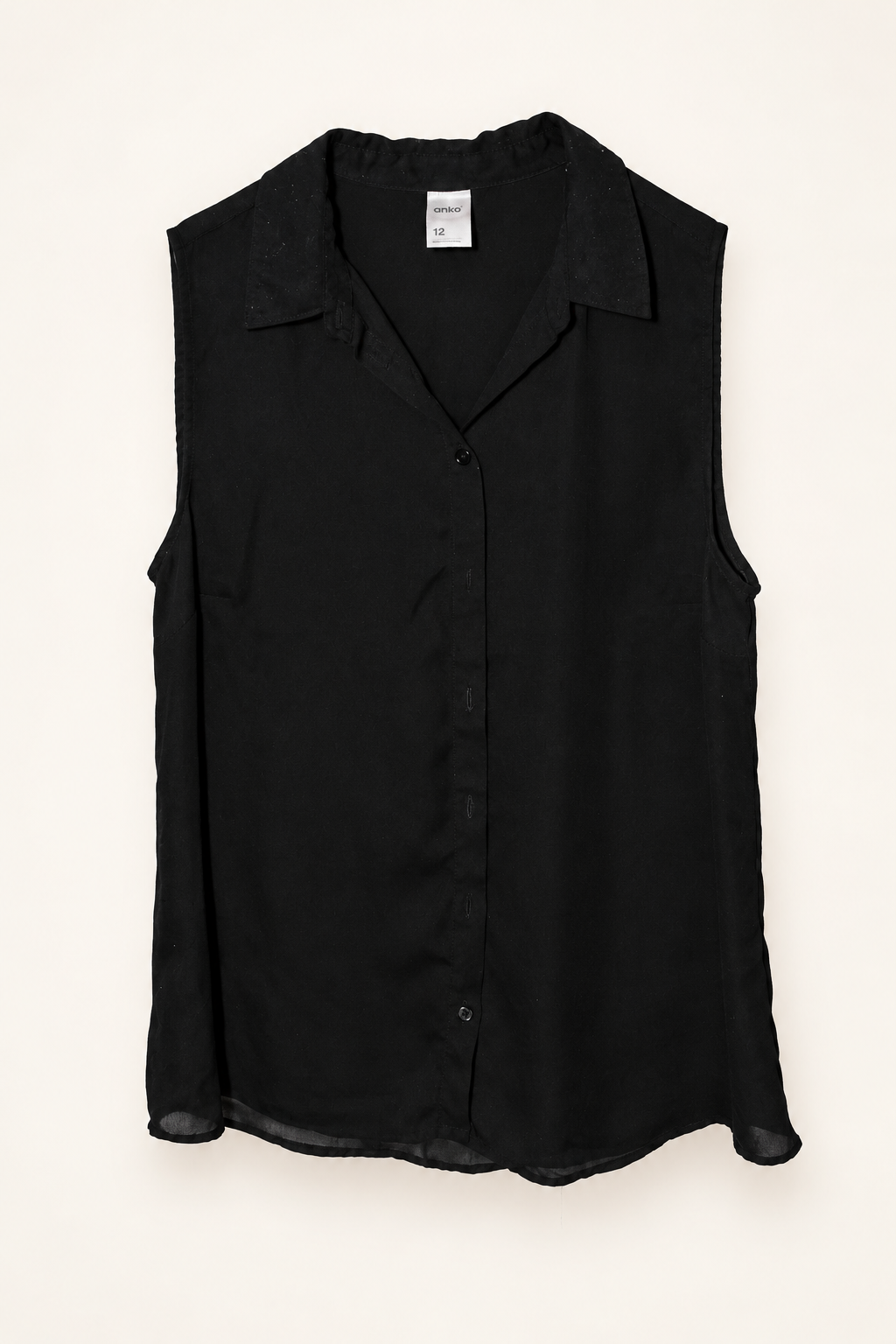 CR-0016, Anko Black Sleeveless Button Blouse, garment-only front view. AI-edited from the actual garment photo; hanger and background removed.