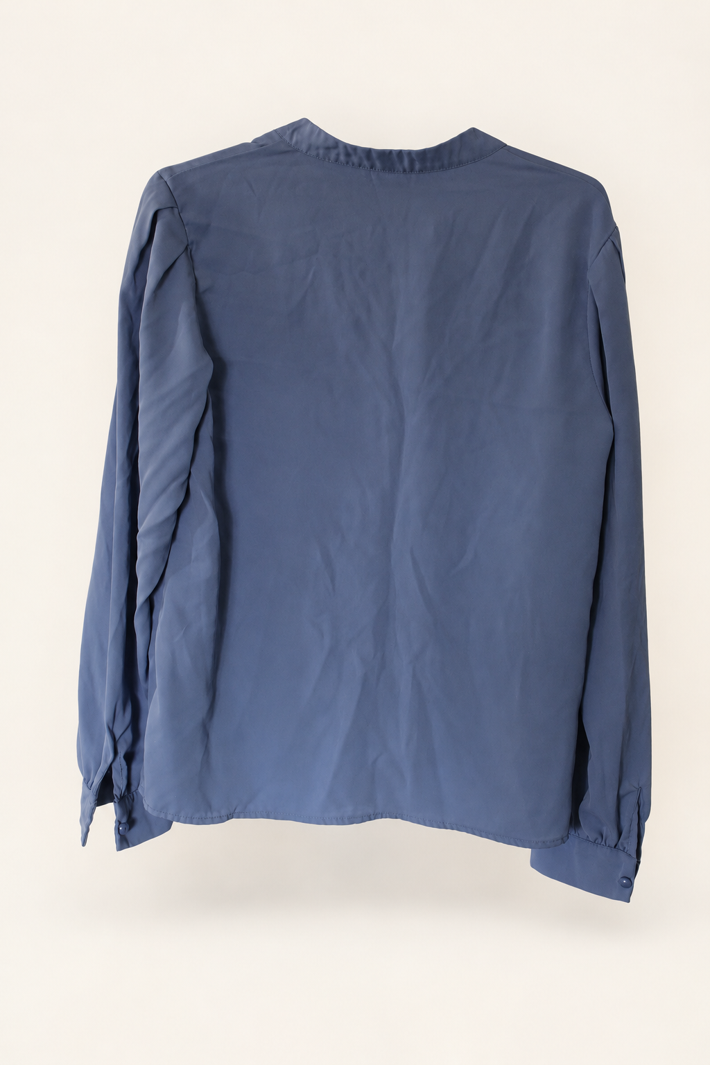 CR-0028, Slate-Blue Band-Collar Blouse, garment-only rear view. AI-edited from the actual garment photo; hanger, support and background removed.