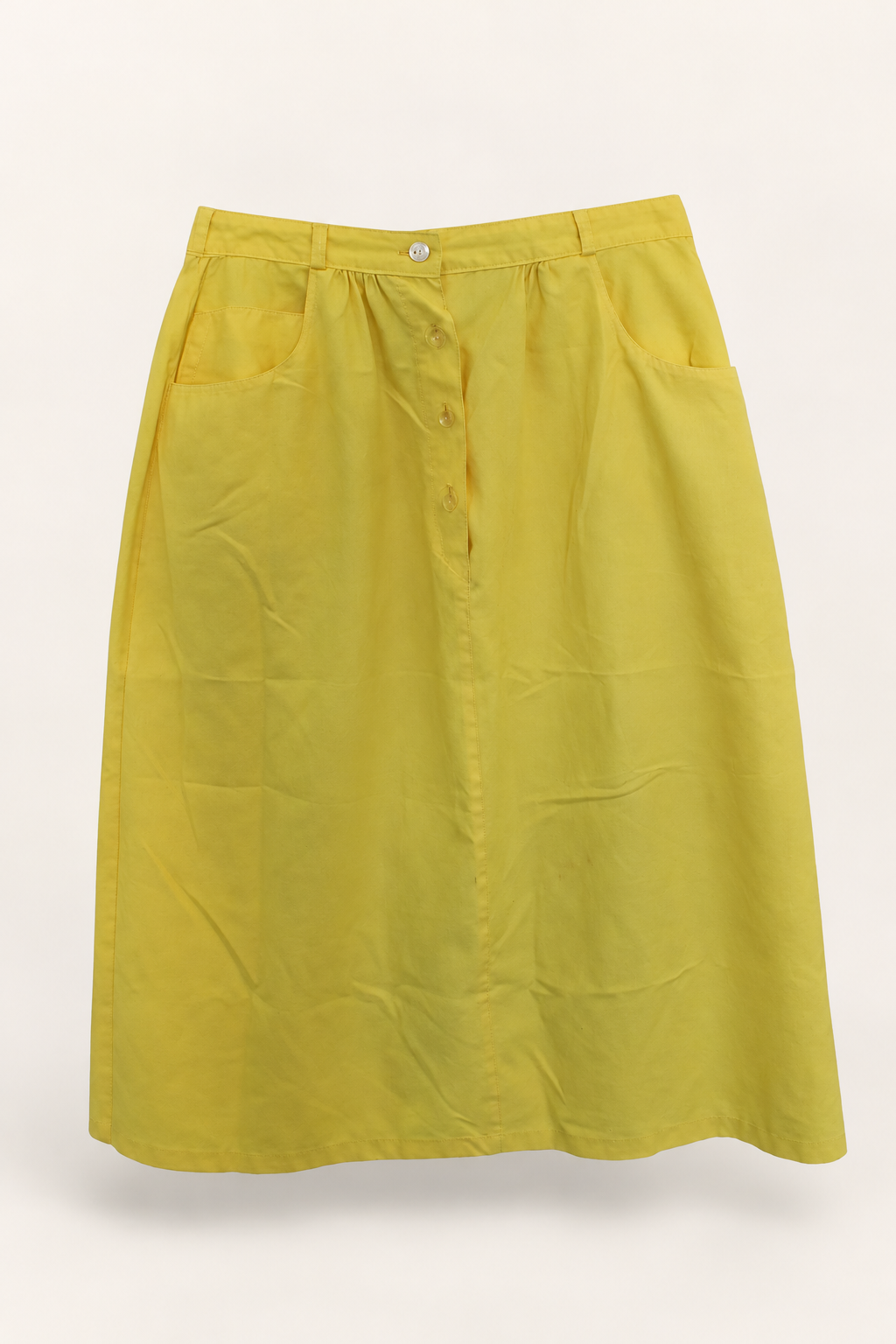 CR-0085, Yellow Pocket-Detail Straight Skirt, garment-only front view. AI-edited from the actual garment photo; hanger and background removed.