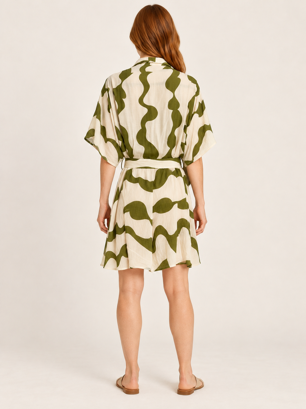 AI-generated rear model view of Winnie & Co Olive & Cream Abstract-Print Shirt Dress