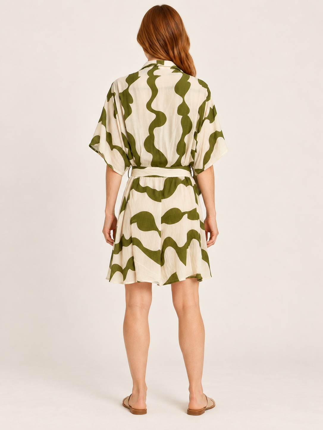 AI-generated rear model view of Winnie & Co Olive & Cream Abstract-Print Shirt Dress