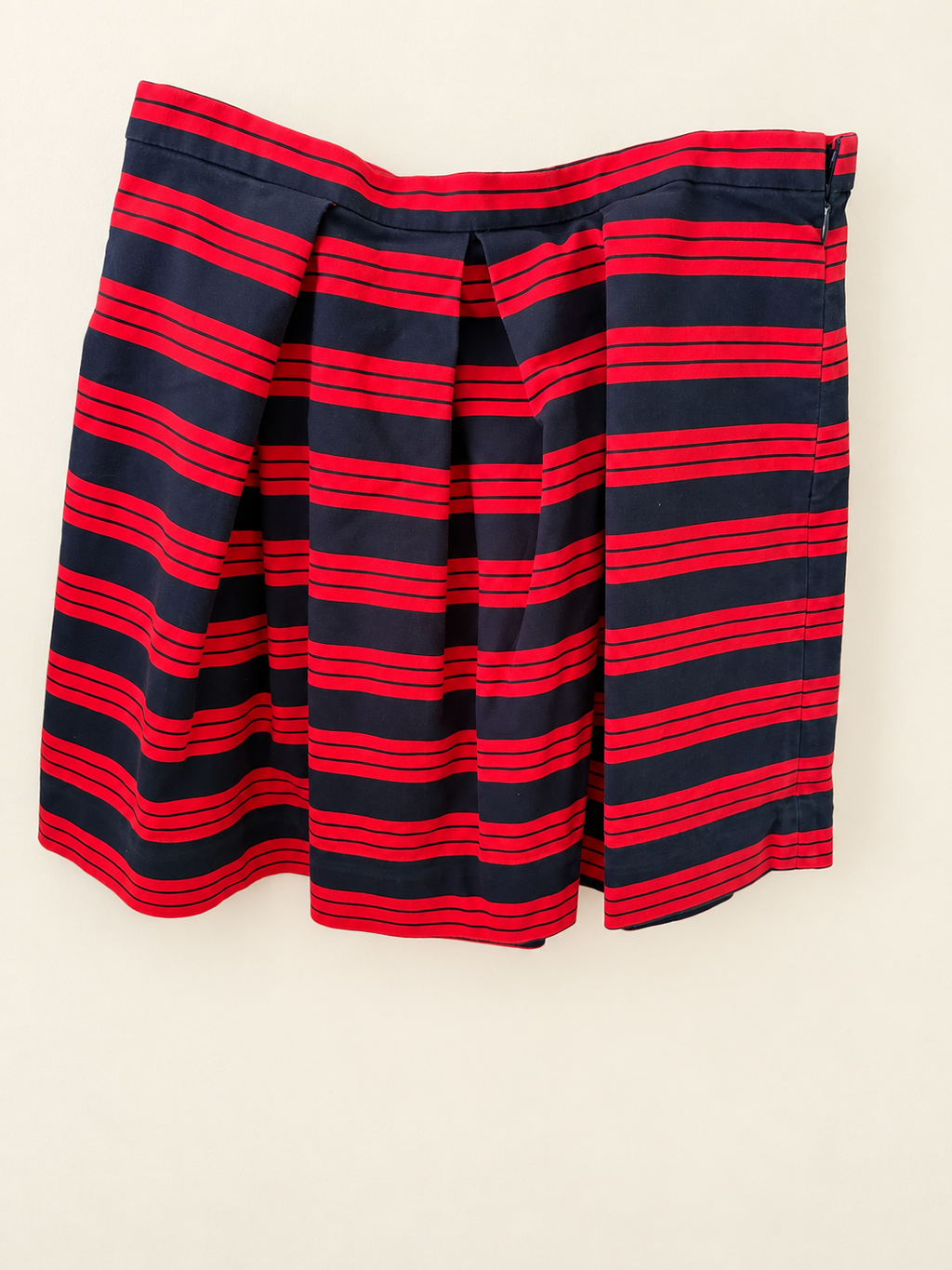 AI-edited garment-only rear view of Gap Red & Navy Striped Pleated Skirt, based on the actual item photo