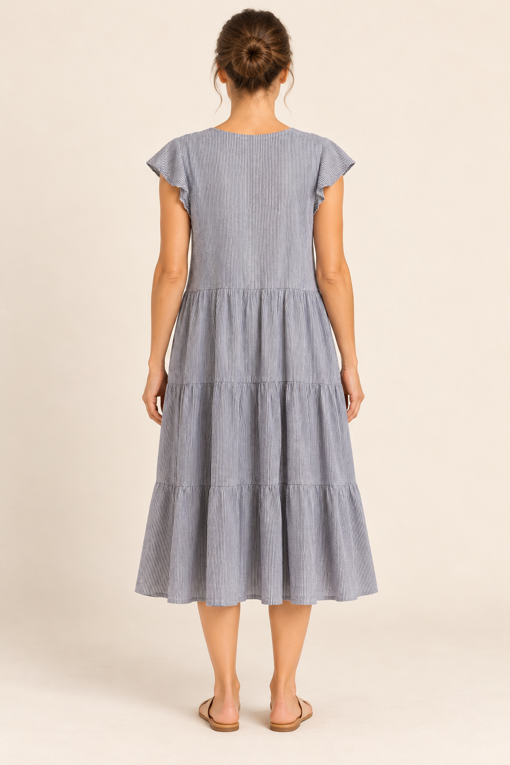 AI-generated model rear view of Betty Basics Fine-Stripe Tiered Dress, based on the original actual garment photograph